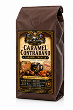 A 12 oz bag of Dept. of Coffee Caramel Contraband Caramel Truffle flavored coffee, shown on a solid black background.