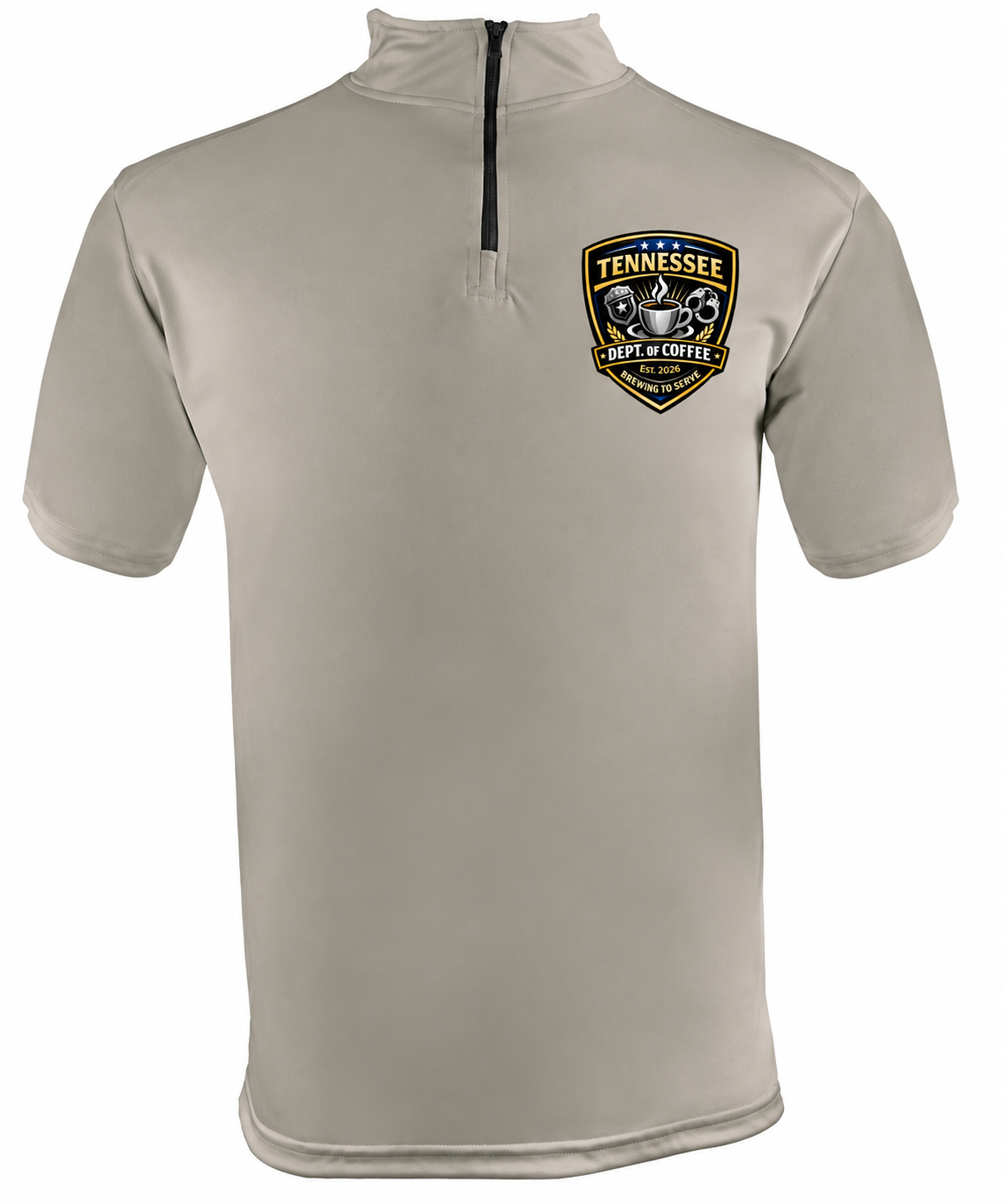 A short-sleeve quarter-zip performance shirt in light beige, featuring a black zipper at the mock neck and a 'Tennessee Golf & Coffee' shield logo on the left chest.